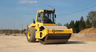 Машинист катка